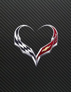 the chevrolet logo is shown on a black carbon fiber background with red and white checkered stripes