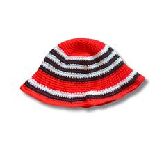 Made to order crochet bucket hat in red with white and black stripes. Perfect for gifting or vacations! Bucket hat coloring pattern is inspired by Nigerian artist Odumodublvck. One size, unisex adult hat sizing measuring approximately 23 inches in circumference. Red Adjustable Crochet Bucket Hat, Red Beanie Crochet Hat For Beach, Red Crochet Beanie For Beach, Casual Red Crochet Bucket Hat, Red Hand-knitted Crochet Hat For Beach, Handmade Red Yarn Hat, Handmade Red Brimmed Crochet Hat, Red Handmade Brimmed Crochet Hat, Casual Red Handmade Crochet Hat