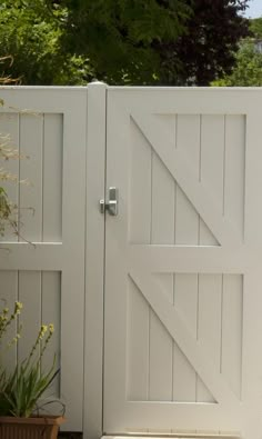 an image of a white wooden gate