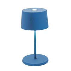 a blue table lamp on a white background