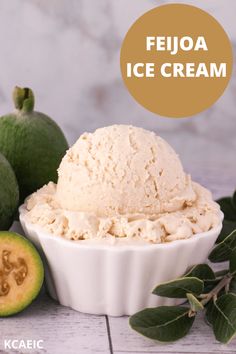 a bowl filled with ice cream next to kiwis and leaves