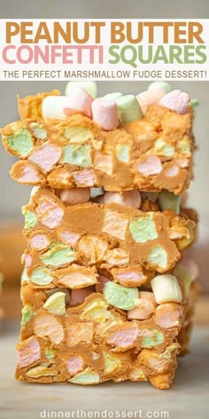 peanut butter confetti squares are stacked on top of each other with marshmallow fudges