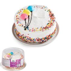 a white cake with sprinkles and balloons on it next to a plastic container