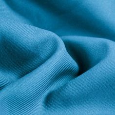 a close up view of a blue fabric