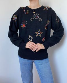 Vintage Betty Barclay sweater, crafted from a blend of wool and angora in classic black.  Its colorful sequined embellishments add a touch of glamour. Meticulously detailed and cozy, this pullover promises both fashion and comfort. Size: S/M, depending on desired it.  Beautiful vintage condition, no stains or holes. Length: Chest: Hip: Arm length from shoulders: EU 40 / UK 12 / US 10 *RETURNS NOT ACCEPTED (Please check all measurements before buying vintage jeans and read the description For best fit, please compare measurements to an item you already own. Please feel free contact me if you need additional measurements or have any questions. Thanks for looking! Have a nice day! Pull Angora, Pull Vintage, Pullover Mode, Angora Sweater, Jean Vintage, Fall Sweater, Pullover Sweater Women, Fall Sweaters, Vintage Wool