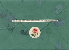 a piece of paper with a rose on it that says, this is not a letter but my arm around you for a brief moment