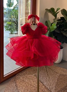 This beautiful handmade red dress is perfect for your little girl to shine on any special occasion. Whether it's Christmas, a birthday party, or a formal gathering, this dress will make your daughter the center of attention. Key Features: *Premium Quality: Made from soft, high-quality fabric to ensure comfort and durability. *Elegant Design: Featuring a beautifully ruffled skirt and puffed sleeves with a stunning bow at the waist, this dress adds a touch of elegance and charm. *Vibrant Red Color: The rich red color makes it ideal for festive occasions like Christmas or any party where your little one needs to stand out. *Perfect Fit: Available for girls aged 1 to 8 years. The dress is designed to provide a comfortable fit while allowing freedom of movement. *Versatile Use: Great for Christ Girl Red Dress, Ruffled Skirt, Dress For Girls, Save The Day, Shine On, Puffed Sleeves, Dress Clothes For Women, Vibrant Red, Red Color