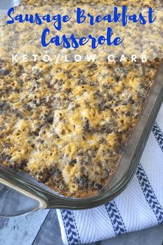 a casserole dish with cheese on top and the words, sausage breakfast casserole