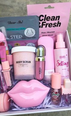 a pink box filled with lots of beauty products