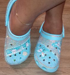 Crocs come in various colors, choose your color and the color of your rhinestones or pearls and allow me to bring your vision to life! Patches and designs can be added. Crocs Custom, Designer Crocs, Bling Crocs, Human Body Activities, Cross Shoes, Custom Sneakers Diy, Custom Crocs, Color Celeste, Custom Bling