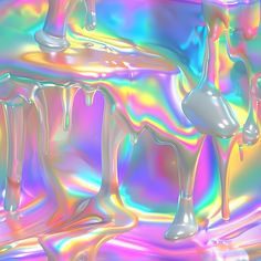 an abstract image of liquid flowing down the side of a wall in pink, blue, and green