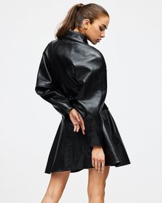 The Cindy dress is a 90's inspired raglan sleeve leather dress with suede paneling. Featuring a mid-thigh length, hourglass waist cut, exaggerated shoulders, and a statement collar. Chic Leather Mini Dress With Long Sleeves, V Cut Leather Dress, Edgy Fitted Faux Leather Dress, Black Long Sleeve Faux Leather Mini Dress, Leather Bodycon Dress Trench Coat, Hourglass Waist, Cindy Dress, Statement Collar, Leather Cleaner