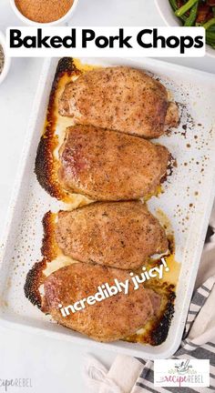 baked pork chops in a baking pan with spices and seasoning on the side