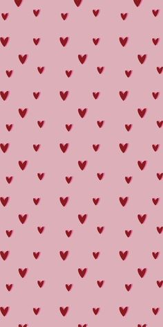 a pink background with red hearts on the left and right sides, all in different sizes