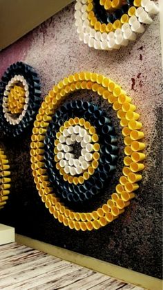 three circles made out of legos on the wall