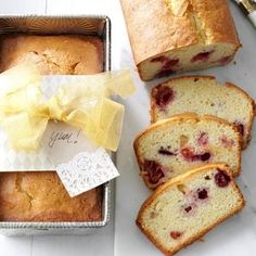 a loaf of lemon raspberry bread next to some slices