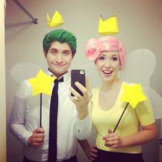 a man and woman dressed up as tinkerbells