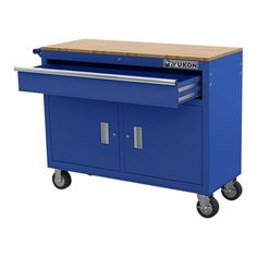 a blue workbench with two drawers and a wooden cutting board on the top