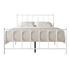 a white metal bed frame with four pillows on the headboard and foot board, in front of a white background