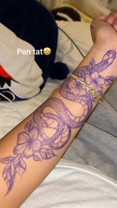 a person with a tattoo on their arm