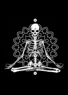 a skeleton sitting in the middle of a yoga pose with two hands on each side