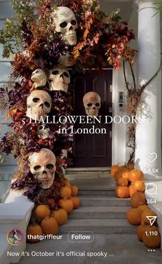 halloween door decorations with skulls and pumpkins on the front steps in london, england