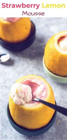 a close up of two oranges with ice cream in them and the title reads strawberry lemon mousse