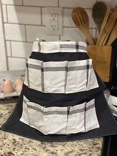 a black and white hat sitting on top of a counter