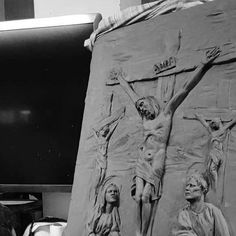 black and white photograph of jesus crucifixion with three women on it