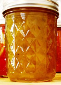 a jar filled with liquid sitting on top of a table