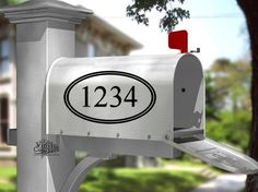 a white mailbox with the number 1234 on it