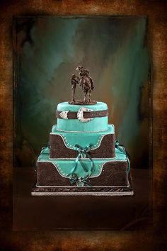 a three tiered cake with a horse on top