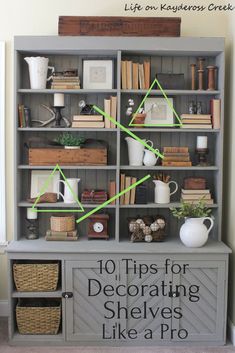 an old bookcase has been decorated with green tape to decorate shelves for books and other things