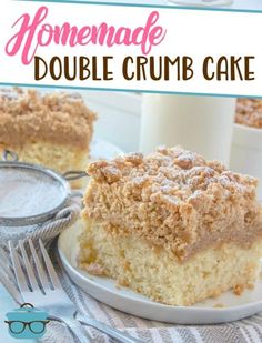 homemade double crumb cake on a plate next to a glass of milk and fork