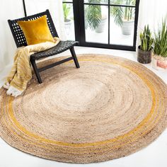 The Natural Fiber Rug Collection features an extensive selection of jute rugs, sisal rugs and other eco-friendly rugs made from innately soft and durable natural fiber yarns. Subtle, organic patterns are created by a dense sisal weave and accentuated in engaging colors and craft-inspired textures. Many designs made with non-slip or cotton backing for cushioned support. Safavieh Natural Fiber Pietsje 5 X 5 (ft) Jute Beige/Gold Round Indoor Border Area Rug | NF807B-5R Jute Round Rug, Gold Area Rug, Sisal Area Rugs, Braided Jute Rug, Rug Round, Jute Area Rugs, Gold Rug, Natural Fiber Rugs, Circle Rug