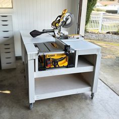 a workbench with tools on it in a garage