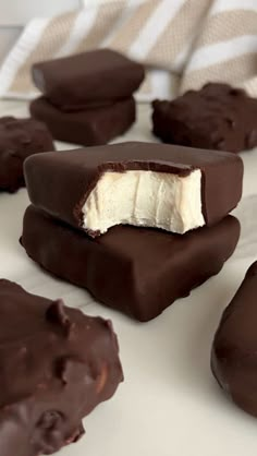 chocolate covered marshmallows on a white plate