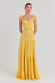 DESCRIPTION & FEATURES MIRANDA is a lace maxi dress, crafted from yellow lace with a nude mesh lining, featuring elegant bow-detailed straps, a sweetheart cupped neckline to the front and square to the back, an underwire bust with padding, and a structured bodice with external corset detailing. The elegant maxi features a three-tiered skirt that gathers and a detachable self-fabric buckle belt. - Yellow lace fabric - Sweetheart neckline to the front and square to the back - Bow-detailed straps - Yellow Lace Dress Outfit, Three Tiered Skirt, Womens Yellow Dress, Nadine Merabi, Yellow Lace, Lace Maxi, Wedding Guests, Lace Maxi Dress, Christmas Wishlist