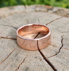 Chunky copper ring made from 100% recycled copper, approx 2mm thick. Available with a polished finish (pictured) or brushed.  This ring is about as straightforward as it gets. The material is copper with rounded polished edges for a comfortable fit. All copper and silver used in our rings is 100% recycled.  This ring would be a wonderful and slightly alternative gift for anyone, or would work equally well as a wedding band or anniversary present (7 years).  We've also partnered with more:trees t Copper Rings For Men, Copper Wedding Ring, Copper Wedding Rings, Purple Heart Wood, How To Polish Copper, Alternative Gifts, Copper Wedding, Suits Men, Plastic Ring