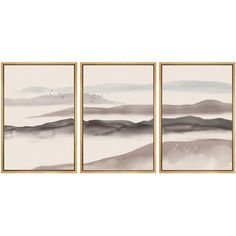 three framed paintings with mountains in the background