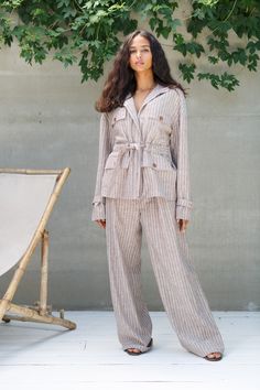 Explore more linen clothes  https://etsy.me/31akCv3 Gorgeous old money linen suit with blazer and pants. Lots of pockets, loose fit and long loose basic pants. One-of-a-kind natural linen suit available to order in any colors. Striped linen pants set  Description: Textile - 100%linen. Striped printed  Blazer with front zipper, lining  and pockets Buttons fastenning cuffs Zipped pants with pockets  I'll be so pleased if your leave your chest, waist and hips measurements with order My pleasure to answer all your questions If you'd like to order it for man, please contact to confirm size.  Available for any custom changes :) Welcome to the Artist Space :) Click to see more embroidered dresses https://www.etsy.com/shop/TheNewDayOutfit?ref=seller-platform-mcnav§ion_id=22956590 Thank you for you Linen Pants Set, Blazer Pants Set, Striped Linen Pants, Basic Pants, Ukrainian Dress, Summer Suit, Linen Suit, Maxi Styles, Pants With Pockets