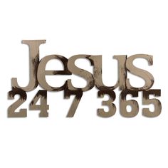 the word jesus is carved into wood with numbers below it to spell out his name