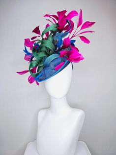 From the 2024 Featured Milliner of the Kentucky Derby Museum  Gorgeous Kentucky Derby hat fascinator  kentucky derby hat fascinator royal blue sinamay saucer with bright fuchsia hot pink branching feathers and green and blue sinamay curls headband attachment each hat is totally one of a kind! no two are alike! * I can add feathers or flowers to any existing hat to help customize your look for a small fee. Message me for requests, I am happy to help!  *All hats are sold as displayed. No returns d Hadestown Costume, Derby Hats Fascinators, Hat Fascinator, Kentucky Derby Hat, Derby Hat, Derby Hats, Kentucky Derby, Green And Blue, Costume Ideas