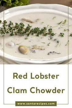 red lobster clam chowder in a white bowl with green leaves on the side