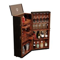 an open wooden cabinet with wine glasses and liquor bottles in the bottom section, on wheels