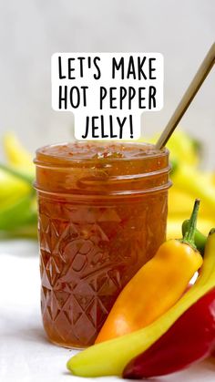 a jar filled with hot pepper jelly next to peppers