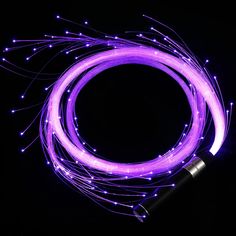 purple light up rope on black background