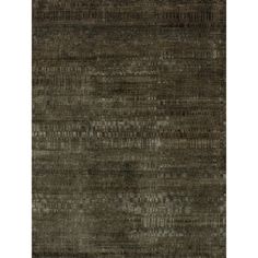 an area rug with dark green and grey colors