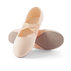 pair of ballet shoes on white background