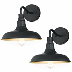 two black wall lights with one light on each side and the other off to the side